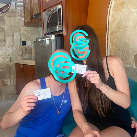 Daniel in Seminyak holding the Rupiah cash he received